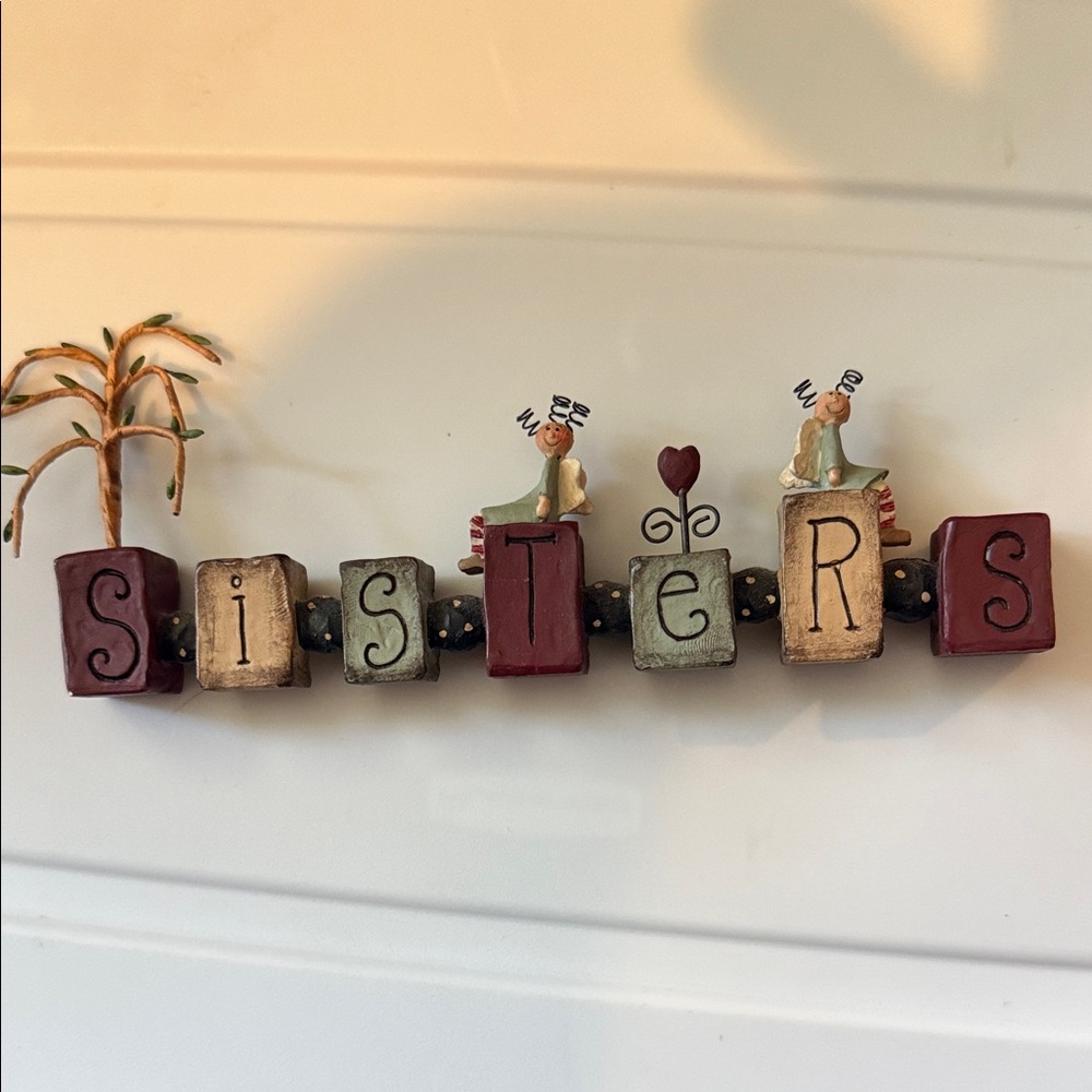 Charming Sisters Art decor with whimsical folk art accents